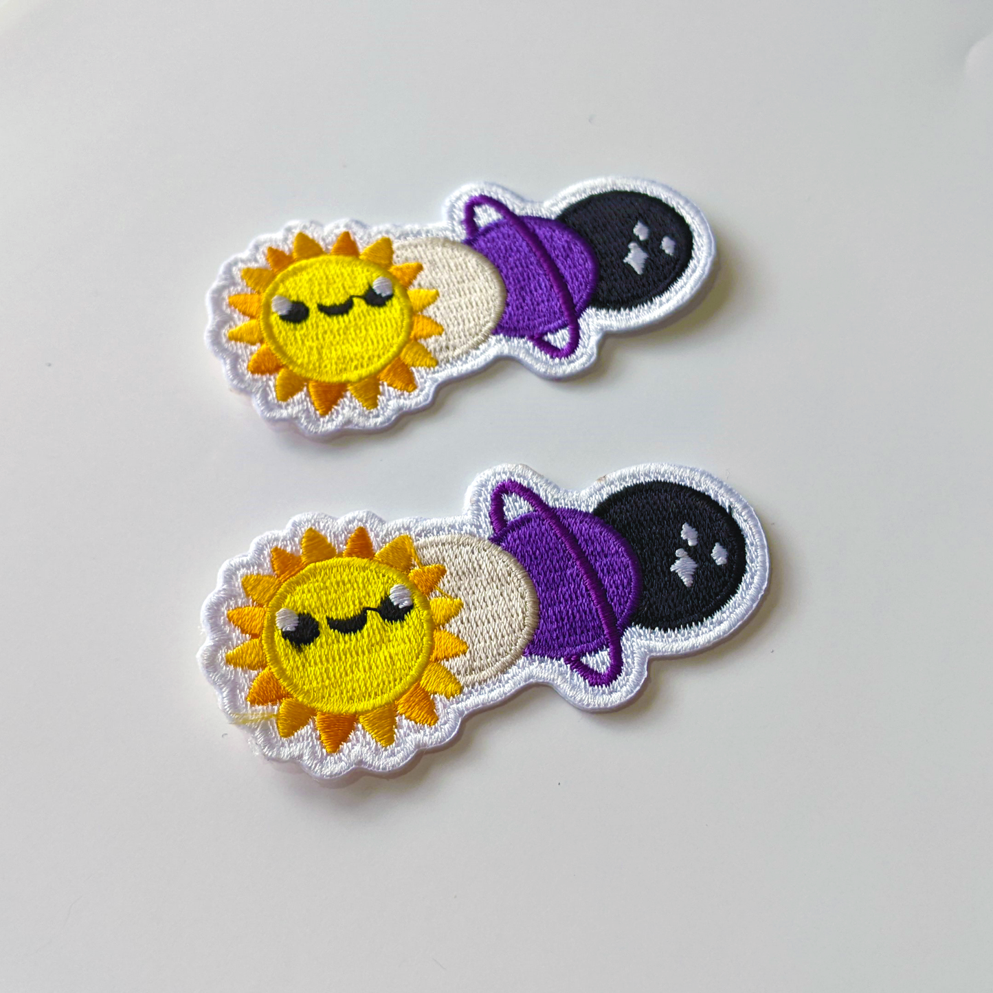 Galaxie non binaire |  écusson