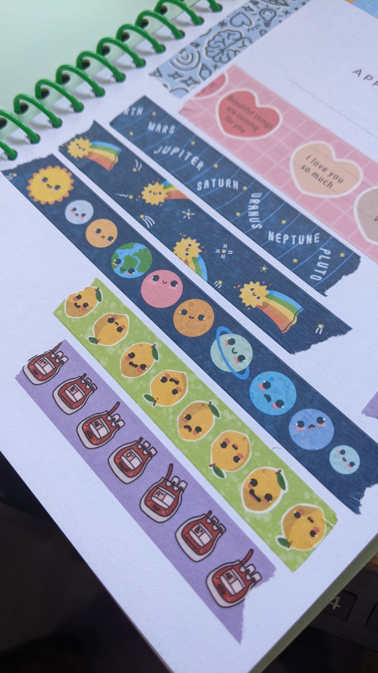 Sticker designs on a planner with colorful elements