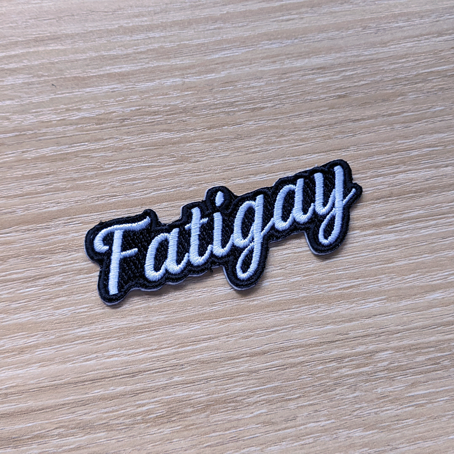 Fatigay |  écusson